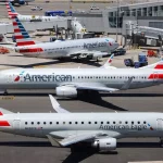 American Airlines grounded all U.S. flights on Christmas Eve, disrupting holiday travel plans, citing a ‘technical issue.’