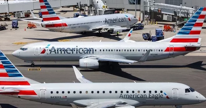 American Airlines grounded all U.S. flights on Christmas Eve, disrupting holiday travel plans, citing a ‘technical issue.’